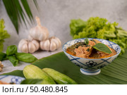Chicken curry with Wax gourd in a ceramic cup, Selective focus. Стоковое фото, агентство Ingram Publishing / Фотобанк Лори