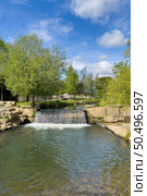 Waterfall on the Caster River in the City Park of Ovar. Стоковое фото, агентство Ingram Publishing / Фотобанк Лори