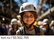 Protector of Dreams: A Young Boy Safeguarding the Future in Hard Hat and Safety Gear. Стоковое AI-изображение, AI-художник Данила Большаков / Фотобанк Лори