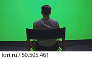 Professional 21 9 monitor for color grading, photo retouching or graphic motion design. Green chroma key screen set up. Spinning director chair for movie editin. Стоковое AI-видео, аниматор Sergey Grishin / Фотобанк Лори