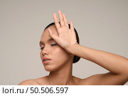 Portrait with manicure hands of beautiful asian woman with natural clean skin nature make up,  fresh spa female beauty cometic, sunblock protect skin, copy space. Стоковое фото, агентство Ingram Publishing / Фотобанк Лори