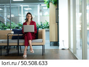 Portrait of Business female rookie in the new entrepreneurial with a laptop as a tool to help in the work. Стоковое фото, агентство Ingram Publishing / Фотобанк Лори