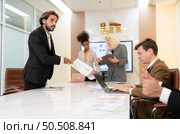 Group of young businessmen in international companies, Meeting to conclude a new responsible project. Стоковое фото, агентство Ingram Publishing / Фотобанк Лори