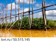 Fishing Weir Structure at Tonle Sap Lake During Daytime in Cambodia. Стоковое фото, фотограф Aleksandr Golubev / Фотобанк Лори
