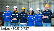 Group of emotional engineers who take pleasure in the achievement of the responsible project’s work. Стоковое фото, агентство Ingram Publishing / Фотобанк Лори