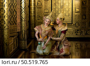 Khon, Is a classical Thai dance in mask. Except for these two characters who weren’t wearing masks. because these are the main actor and actress of the story. Стоковое фото, агентство Ingram Publishing / Фотобанк Лори