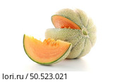 Juicy honeydew melon on a white background. Стоковое фото, агентство Ingram Publishing / Фотобанк Лори