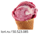 Ice cream cone with scoop of red fruits isolated on white background. Стоковое фото, агентство Ingram Publishing / Фотобанк Лори