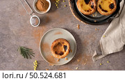 Egg tarts, traditional Portuguese dessert, pastel de nata on a plate. Стоковое фото, агентство Ingram Publishing / Фотобанк Лори