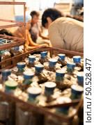 The mushroom lumps in the baskets are packed in bags ready to be filled with leavening agent and taken to the growing house. Стоковое фото, агентство Ingram Publishing / Фотобанк Лори