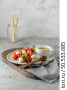 Italian style appetizer, antipasto skewer or caprese on a stick with basil, salami, mozarella and tomatoes. Стоковое фото, агентство Ingram Publishing / Фотобанк Лори