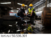 Scientists and government officials Inspect and collect chemical leak samples in industrial sites. to be thoroughly investigated in the laboratory. Стоковое фото, агентство Ingram Publishing / Фотобанк Лори
