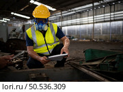 Scientists and government officials Inspect and collect chemical leak samples in industrial sites. to be thoroughly investigated in the laboratory. Стоковое фото, агентство Ingram Publishing / Фотобанк Лори