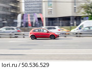 Red Ford Fiesta car moving on speedway. Редакционное фото, фотограф Константин Григорьев / Фотобанк Лори