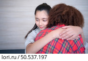Portrait of Teenage embrace each other to encourage each other. Стоковое фото, агентство Ingram Publishing / Фотобанк Лори