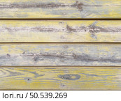Yellow painted old wooden wall. Yellow background. Стоковое фото, агентство Ingram Publishing / Фотобанк Лори