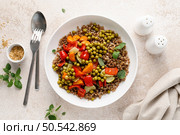 Buckwheat with roasted vegetables and green peas. Стоковое фото, агентство Ingram Publishing / Фотобанк Лори