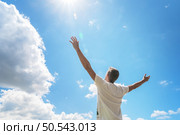 Man strive to the sky. Spirit and emotional scene. Стоковое фото, агентство Ingram Publishing / Фотобанк Лори