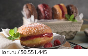 Bolas de Berlim, or "Berlin Balls". Portuguese fried dough with sugar, Filled with sweet cream. Стоковое фото, агентство Ingram Publishing / Фотобанк Лори