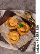 Pastries filled with meat, traditionally baked in black clay molds both from the region on Vila Real, Portugal. Стоковое фото, агентство Ingram Publishing / Фотобанк Лори