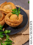 Pastries filled with meat, traditionally baked in black clay molds both from the region on Vila Real, Portugal. Стоковое фото, агентство Ingram Publishing / Фотобанк Лори