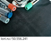 medicine, diabetes, advertisement and health care concept - close up of glucometer with blood sugar test stripe, insulin injection syringes and pills on table. Стоковое фото, агентство Ingram Publishing / Фотобанк Лори