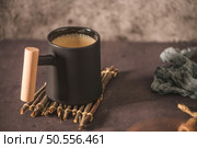 Coffee mug on a dark slate, stone or concrete background. Стоковое фото, агентство Ingram Publishing / Фотобанк Лори