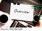 Overview is written on white piece of paper. Overview Brief Summary Description Conclusion. Стоковое фото, агентство Ingram Publishing / Фотобанк Лори