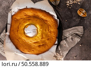 Portuguese sponge cake wrapped in the typical paper used on the baking. Стоковое фото, агентство Ingram Publishing / Фотобанк Лори