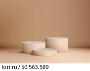 Elegant 3D Scene Featuring Three Beige Podiums on a Soft Beige Backdrop, Ideal for Product Mockups, Showrooms, and Contemporary Visual Branding. Стоковая иллюстрация, агентство Ingram Publishing / Фотобанк Лори