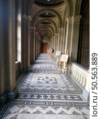 Corridor of the castle with easels along interior view vertical. Стоковое фото, агентство Ingram Publishing / Фотобанк Лори