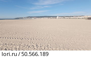Figueira da Foz Beach, Portugal, with a clear blue sky and fine sand. Стоковое фото, агентство Ingram Publishing / Фотобанк Лори
