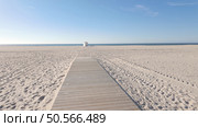 Figueira da Foz Beach, Portugal, with a clear blue sky and fine sand. Стоковое фото, агентство Ingram Publishing / Фотобанк Лори