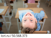 When class becomes dull. The kids started to feel play mischievous. Стоковое фото, агентство Ingram Publishing / Фотобанк Лори