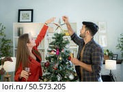 Multiethnic friends had fun party and drinking wine at home. Стоковое фото, агентство Ingram Publishing / Фотобанк Лори