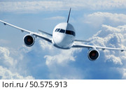 Passenger Airliner flying in the clouds . Стоковое фото, агентство Ingram Publishing / Фотобанк Лори