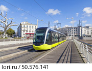 Yellow tram an the street of Brest, Brittany, France. Стоковое фото, агентство Ingram Publishing / Фотобанк Лори