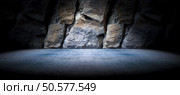 Cement floor and rock wall background and spotlight. Concrete and rock floor background. Стоковое фото, агентство Ingram Publishing / Фотобанк Лори