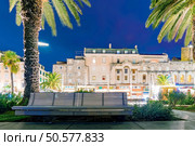 Architecture along the seafront promenade at night. Стоковое фото, агентство Ingram Publishing / Фотобанк Лори