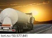 Container on the big highway. transport loads                       . Стоковое фото, агентство Ingram Publishing / Фотобанк Лори