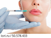 Botox shot in the female cheek, Стоковое фото, агентство Ingram Publishing / Фотобанк Лори