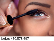 Close-up of make-up eye with long lashes with black mascara. Стоковое фото, агентство Ingram Publishing / Фотобанк Лори