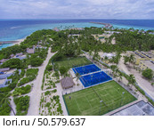 Maldives paradise scenery. Tropical aerial landscape, seascape with long jetty, water villas with amazing sea and lagoon beach, tropical nature. Exotic tourism destination banner, summer vacation. Стоковое фото, агентство Ingram Publishing / Фотобанк Лори