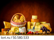 Cheese with Bread and Food on wooden table in still life. Стоковое фото, агентство Ingram Publishing / Фотобанк Лори