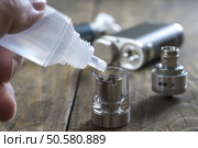 Advanced personal vaporizer or e-cigarette, close up. Стоковое фото, агентство Ingram Publishing / Фотобанк Лори