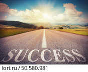 Road that says success in the asphalt. Success road. Стоковое фото, агентство Ingram Publishing / Фотобанк Лори
