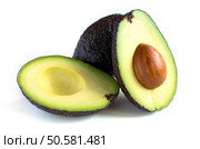 A fresh avocado cut in half. Стоковое фото, агентство Ingram Publishing / Фотобанк Лори