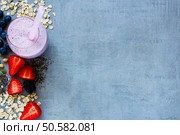 Freshly made berry smoothie on grey vintage background - Healthy eating, Detox or Diet concept. Стоковое фото, агентство Ingram Publishing / Фотобанк Лори