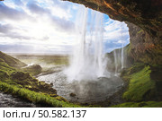 beautiful waterfall at sunset. Стоковое фото, агентство Ingram Publishing / Фотобанк Лори