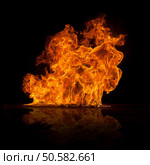Beautiful stylish fire flames, close-up.. Beautiful stylish fire flames. Стоковое фото, агентство Ingram Publishing / Фотобанк Лори